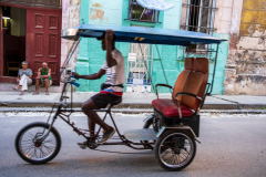 Bicitaxi Passing the Curbside Watch